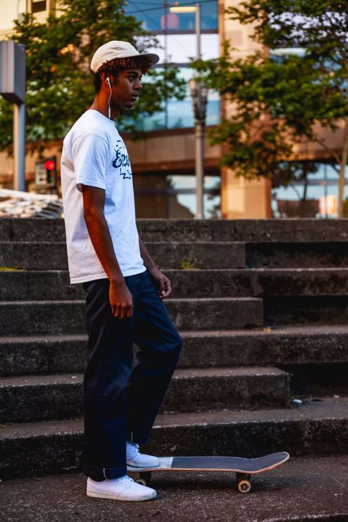 teen with skateboard